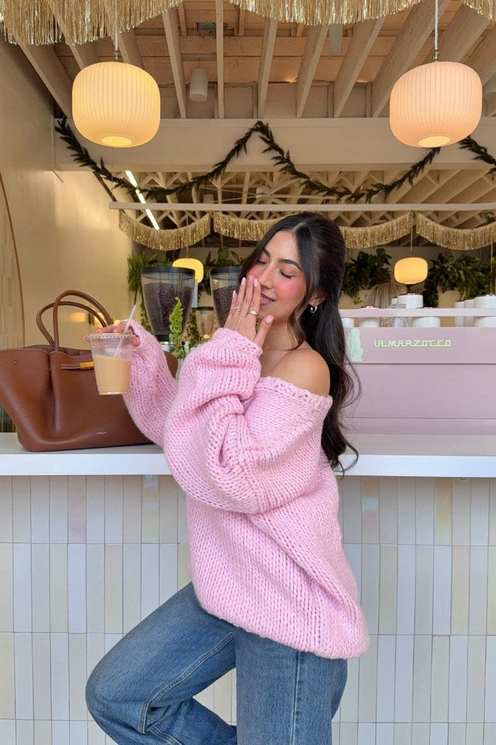 Beginning Boutique Delvey Light Pink Chunky Knit Sweater light pink oversized off-shoulder chunky knit sweater with long slee